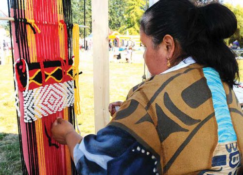 Coast Salish weaver Joy Joseph-McCullough created a wool piece during the festival. She also does cedar weaving work.